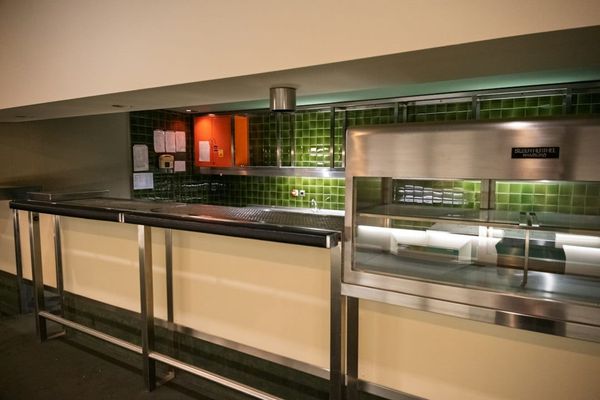 Post-treatment clean commercial kitchen with documentation