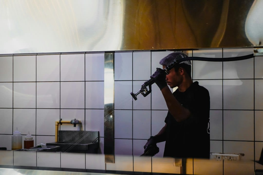 Commercial pest control inspection in a professional kitchen
