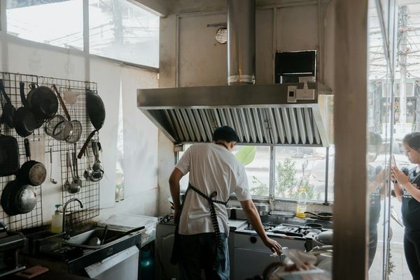 Technician inspecting commercial kitchen